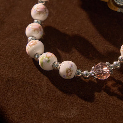 Christianartworkshop Multi-color Floral Ceramic Stretch Bracelet with Miraculous Medal & Crucifix: Subtle Faith Elegance